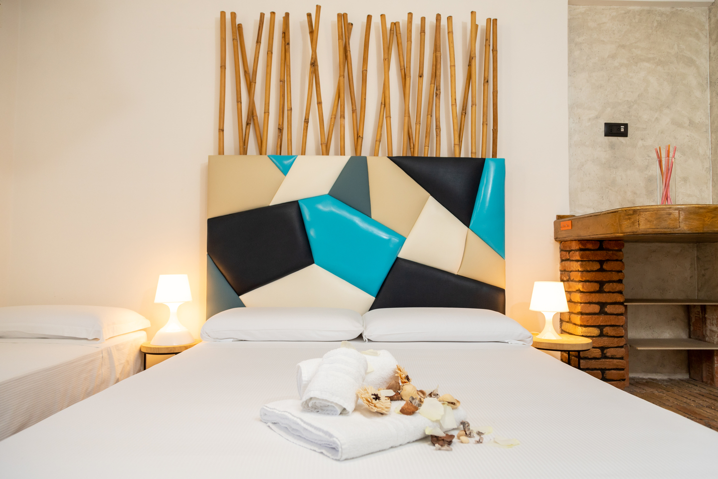Letto camera Atlantide e asciugamano